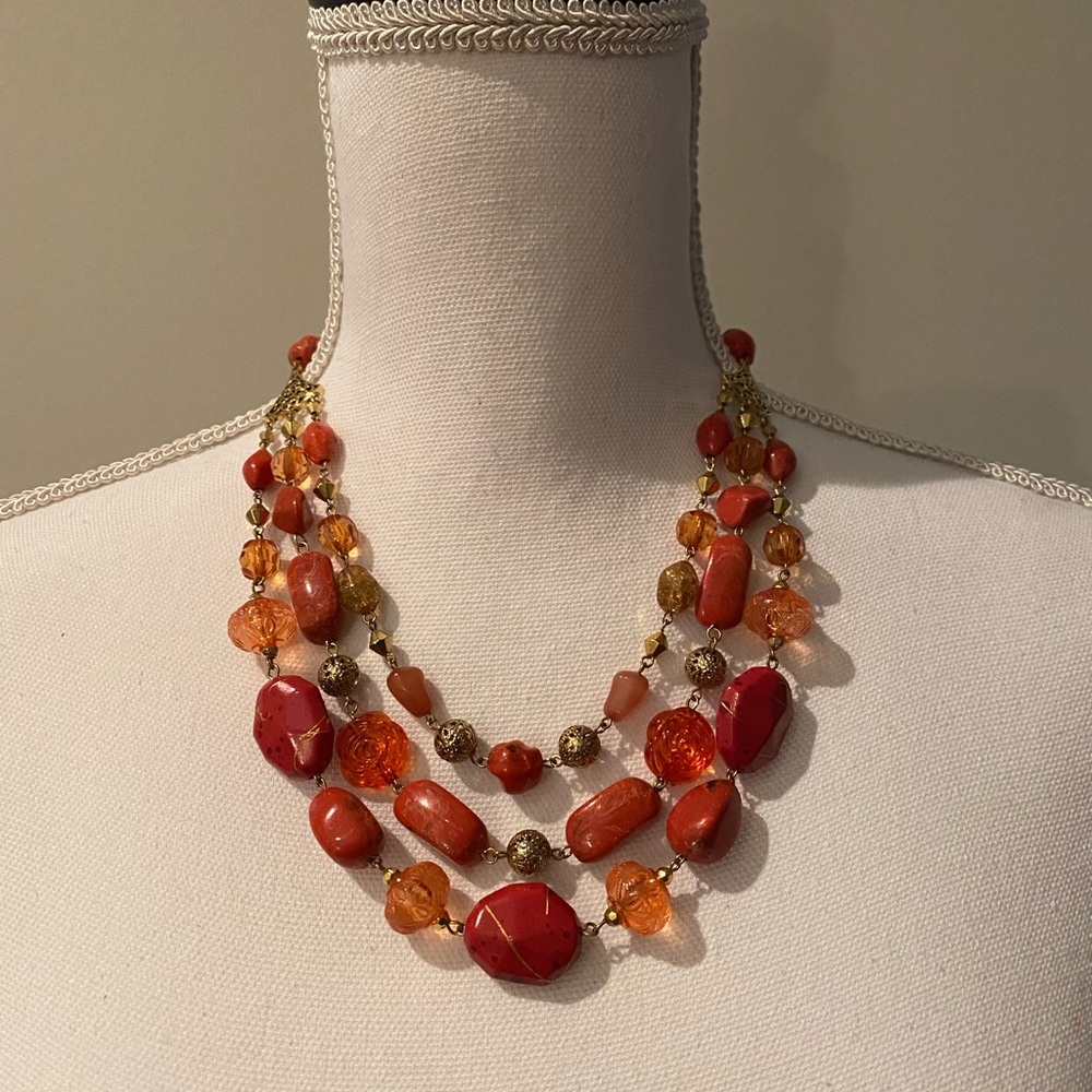 Gold 3-strand beaded necklace -various shades of orange